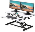 FITUEYES Height Adjustable Standing Desk 36” Wide Sit to Stand Converter Stand Up Desk Tabletop Workstation for Laptops Dual Monitor Riser White SD309103WW